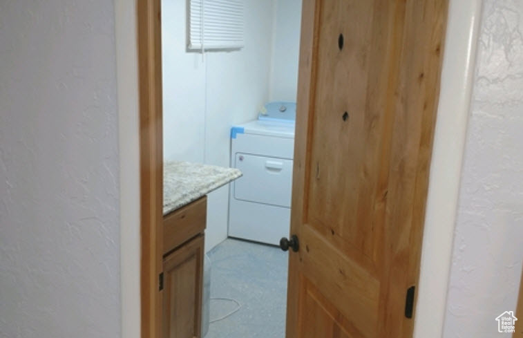 Basement  Clothes washing area with washer / clothes dryer