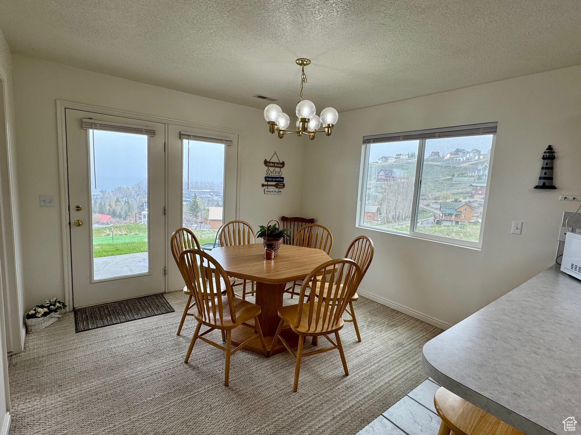 Dining area featuring a wealth of natural light