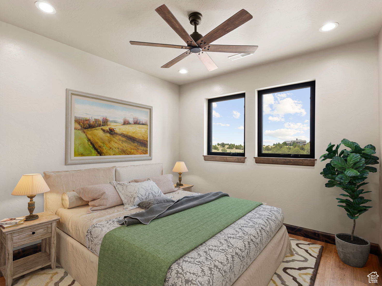 Private secondary bedroom with real hardwood floors (virtually staged)