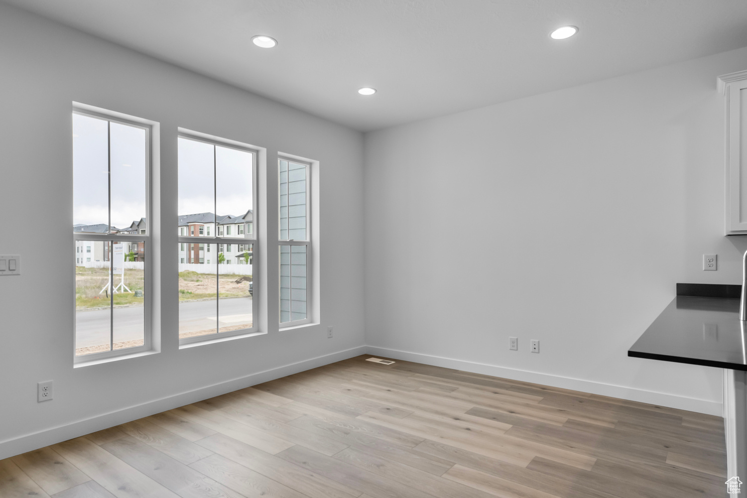 Unfurnished room featuring light hardwood / wood-style floors