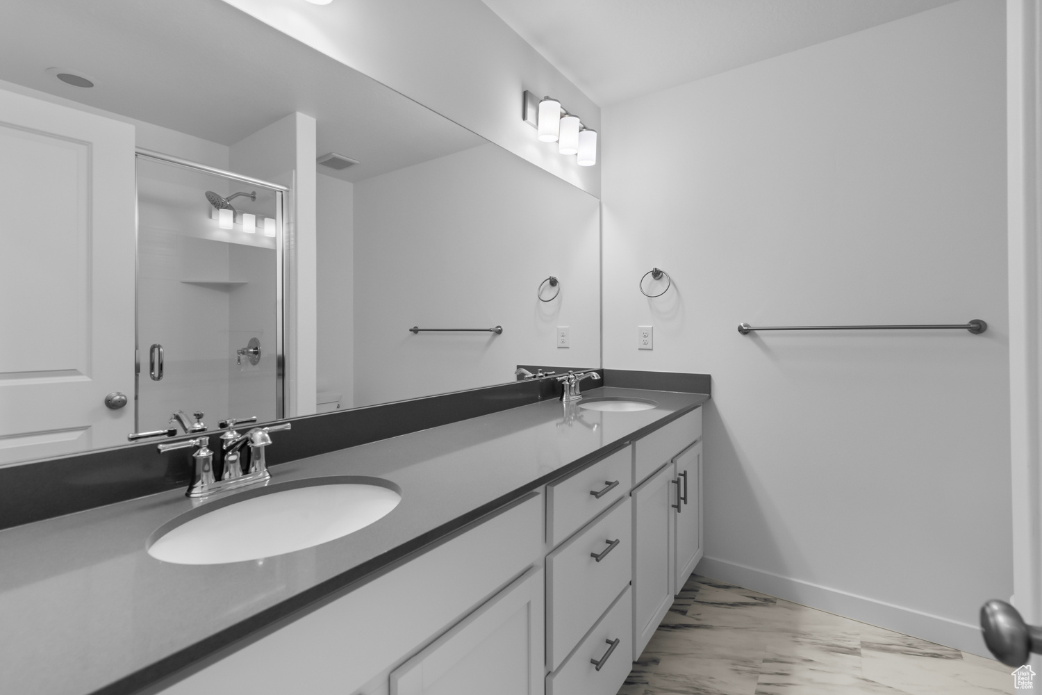 Bathroom featuring double sink vanity