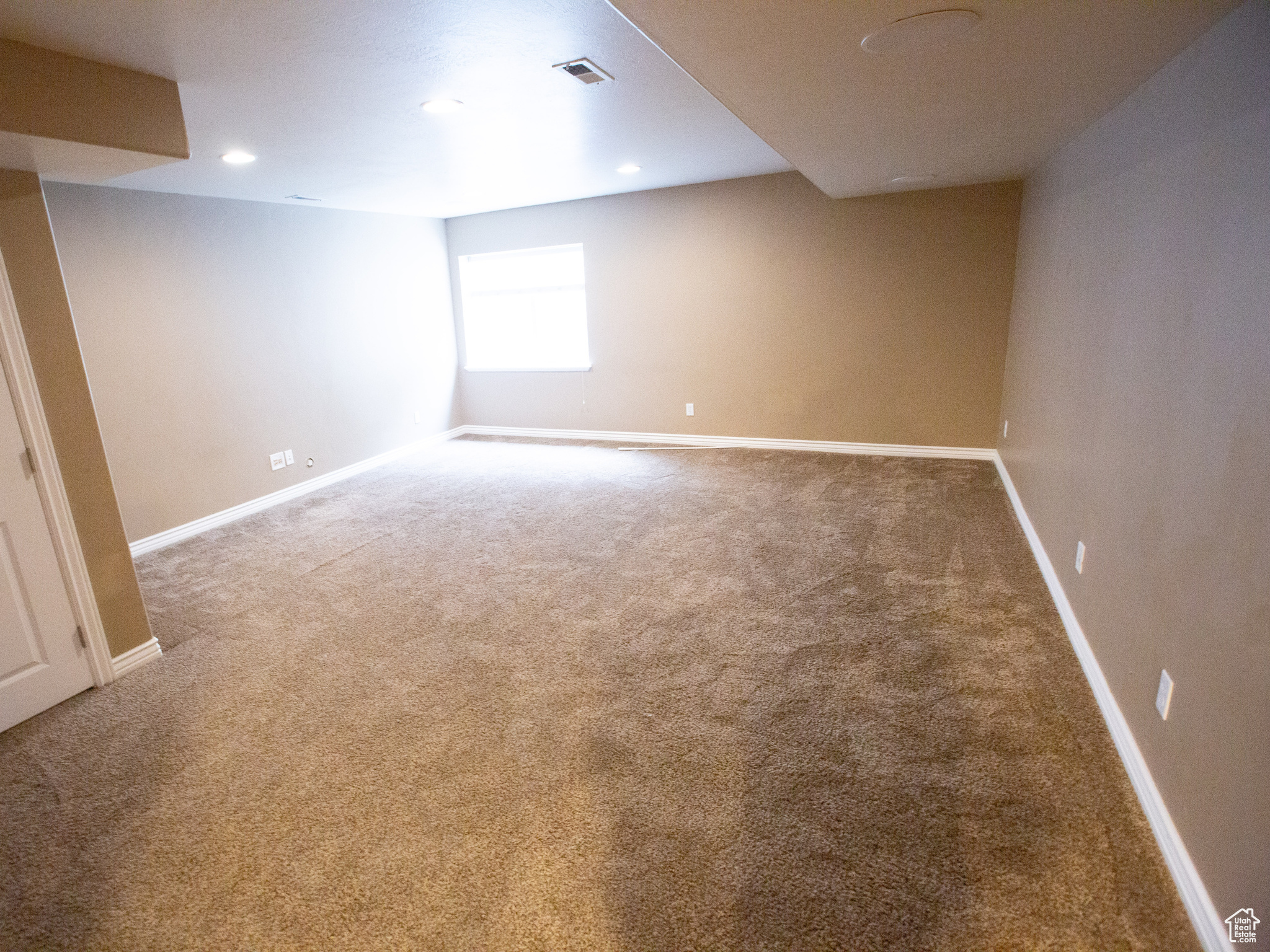 Basement featuring carpet floors