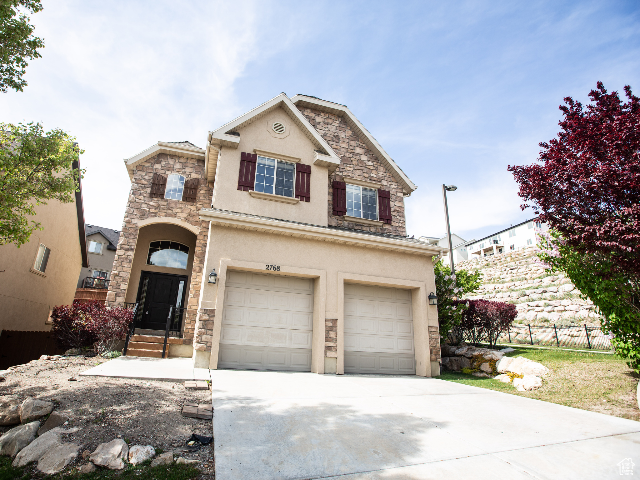 View of front of home with a garage