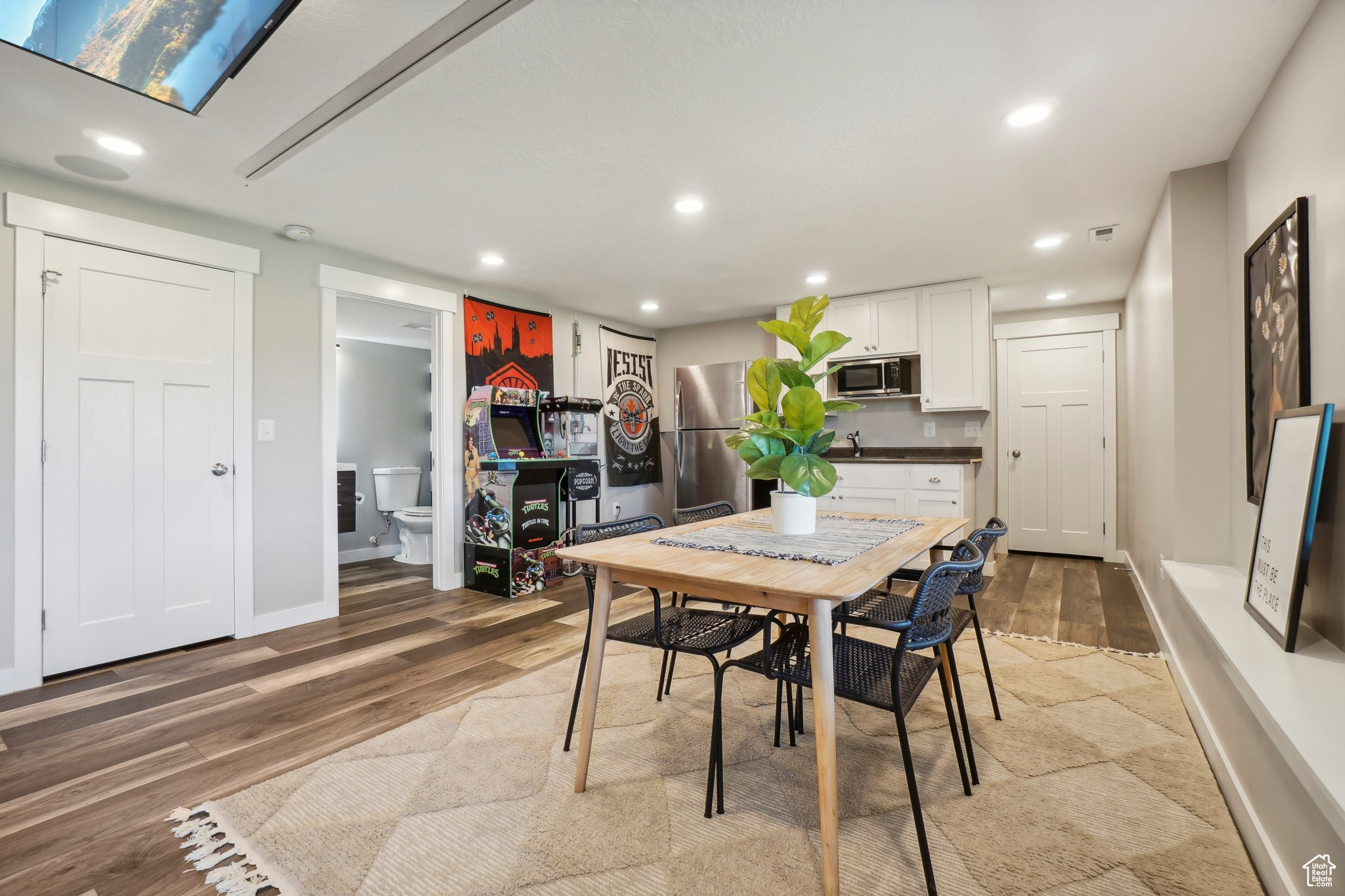 Dining space featuring hardwood / wood-style flooring