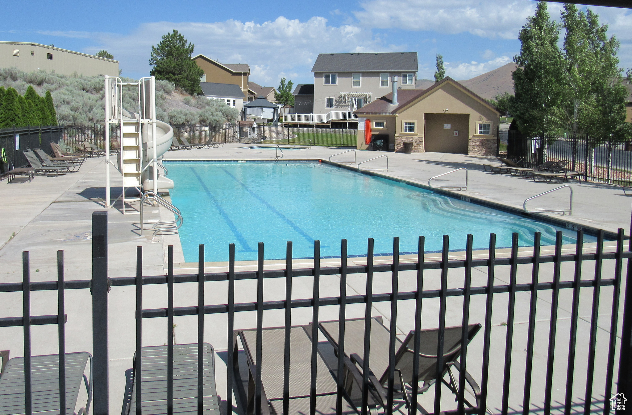 View of swimming pool with a patio area