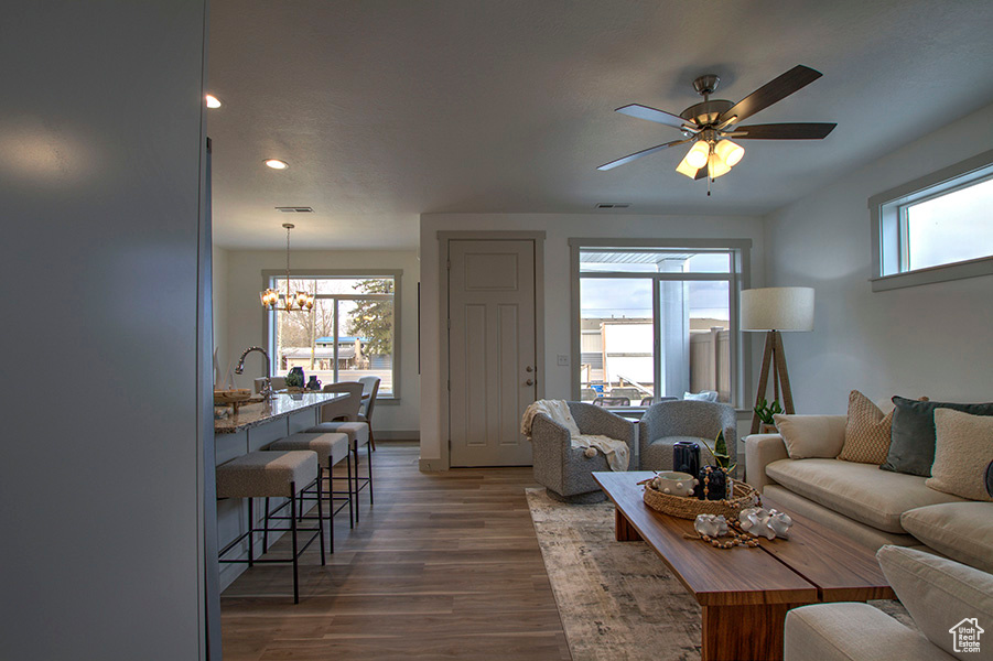 Lower level living area, kitchen, dining with walkout to patio