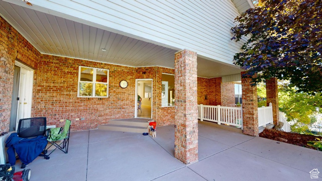 View of the rear patio leading into the home