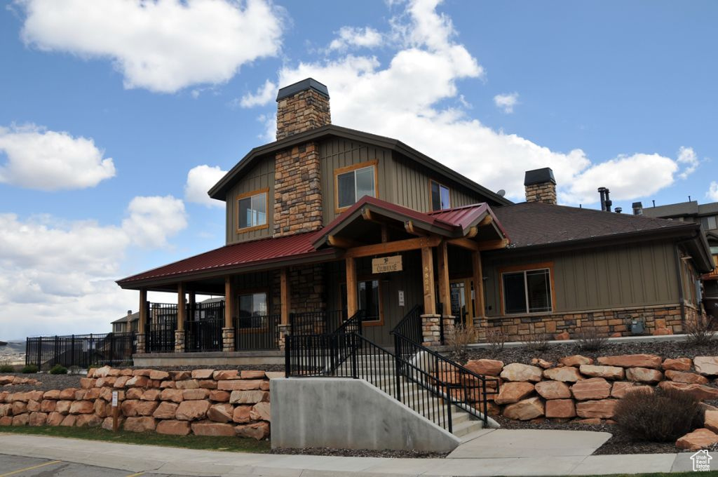 View of front of house with covered porch