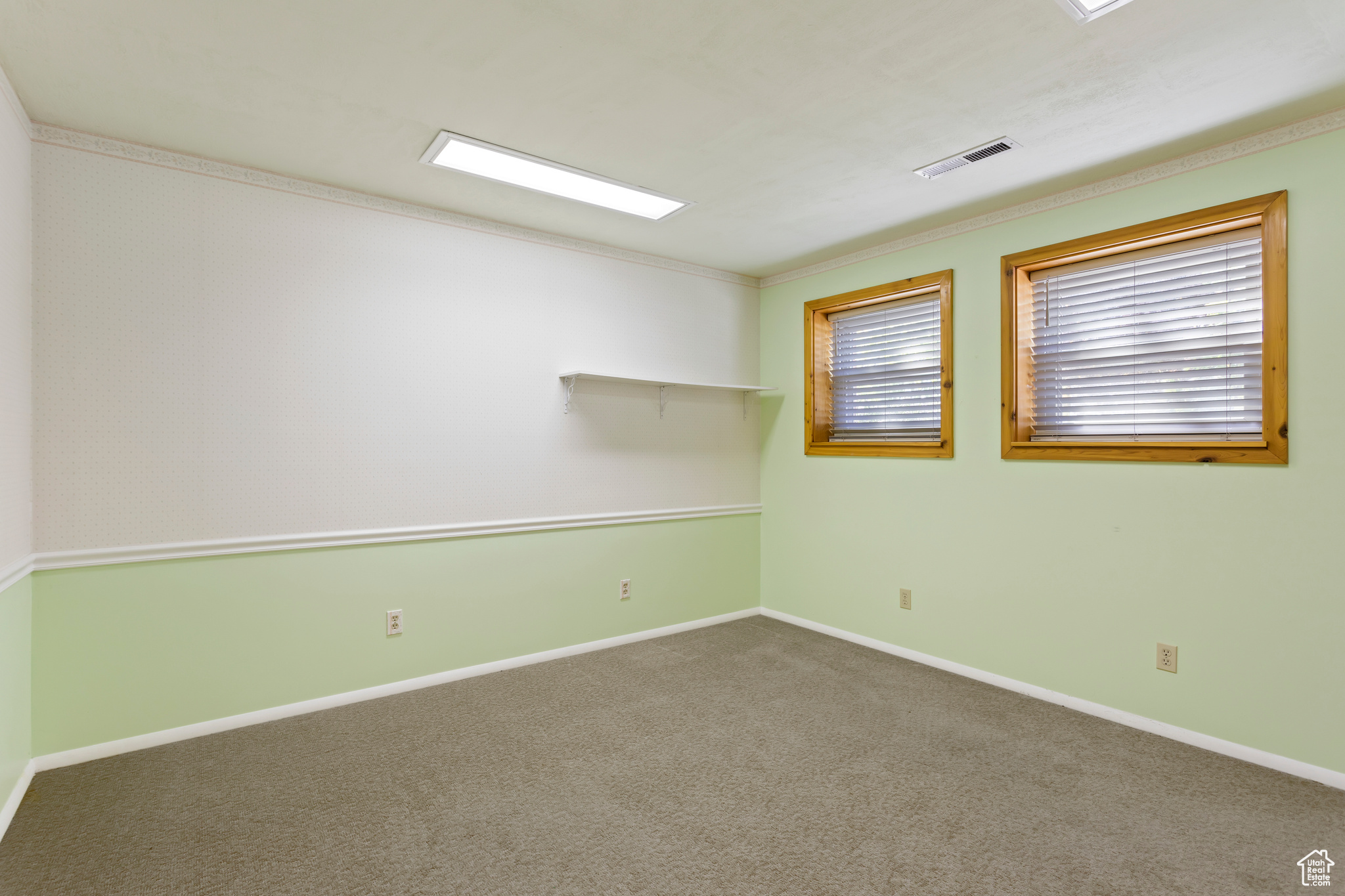 View of carpeted spare room