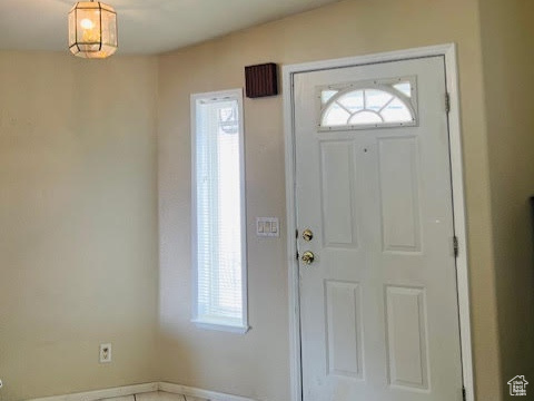 Foyer entrance featuring a wealth of natural light