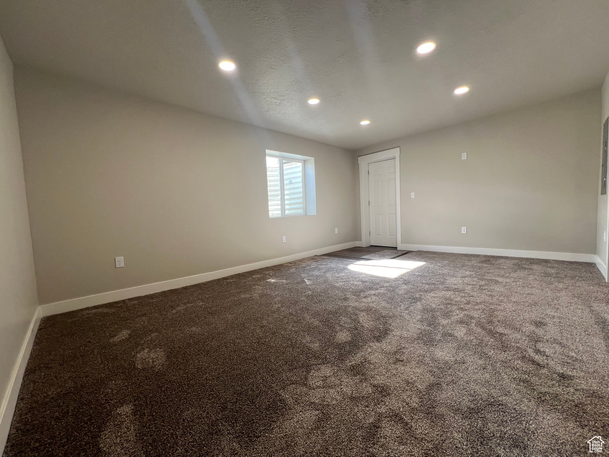 Unfurnished room featuring carpet floors