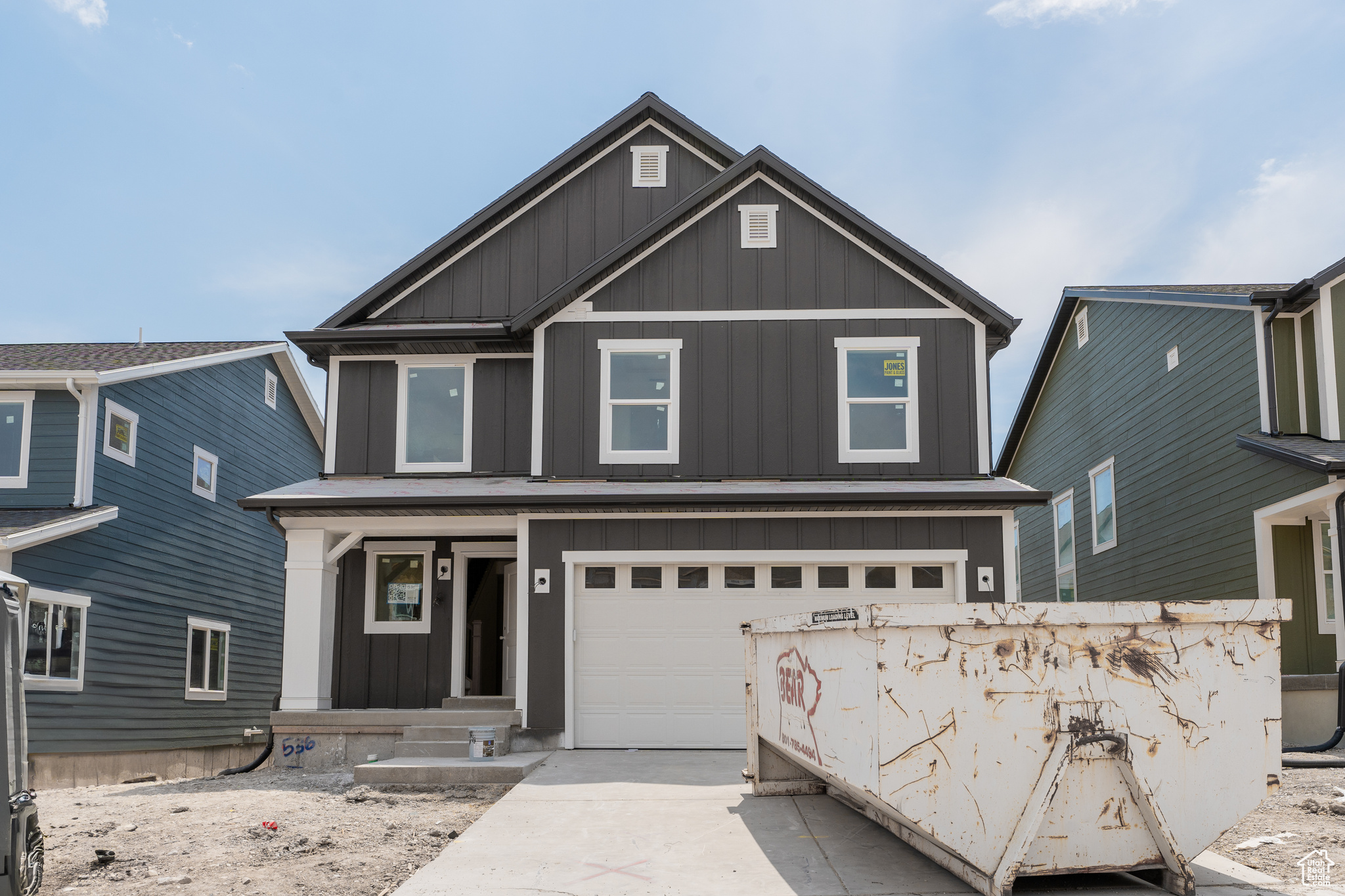 View of front of home featuring a garage