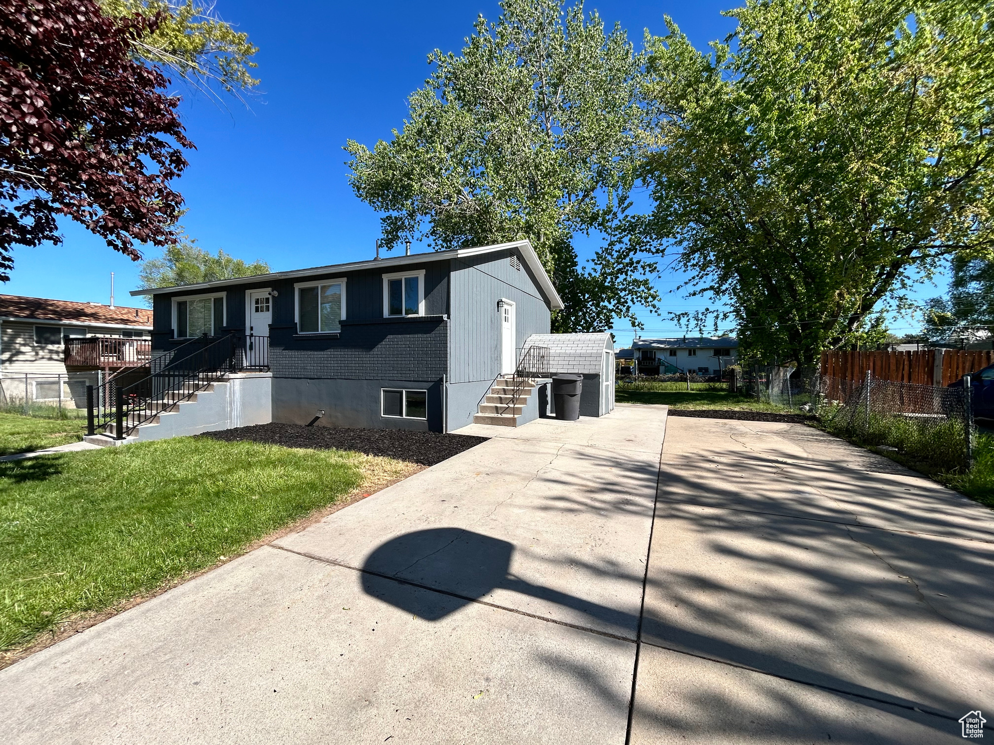 View of front of property with a front yard