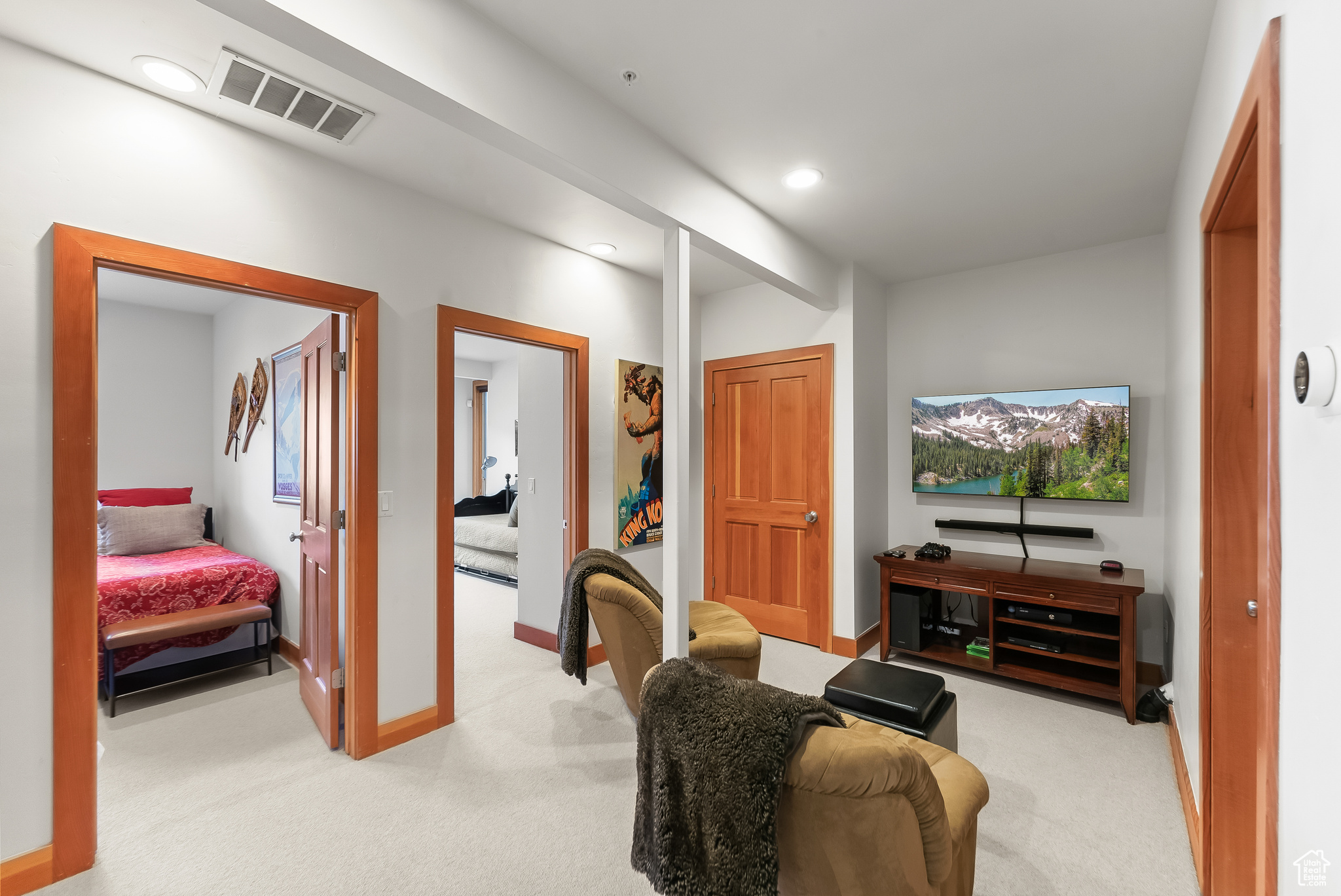 Sitting room with carpet flooring