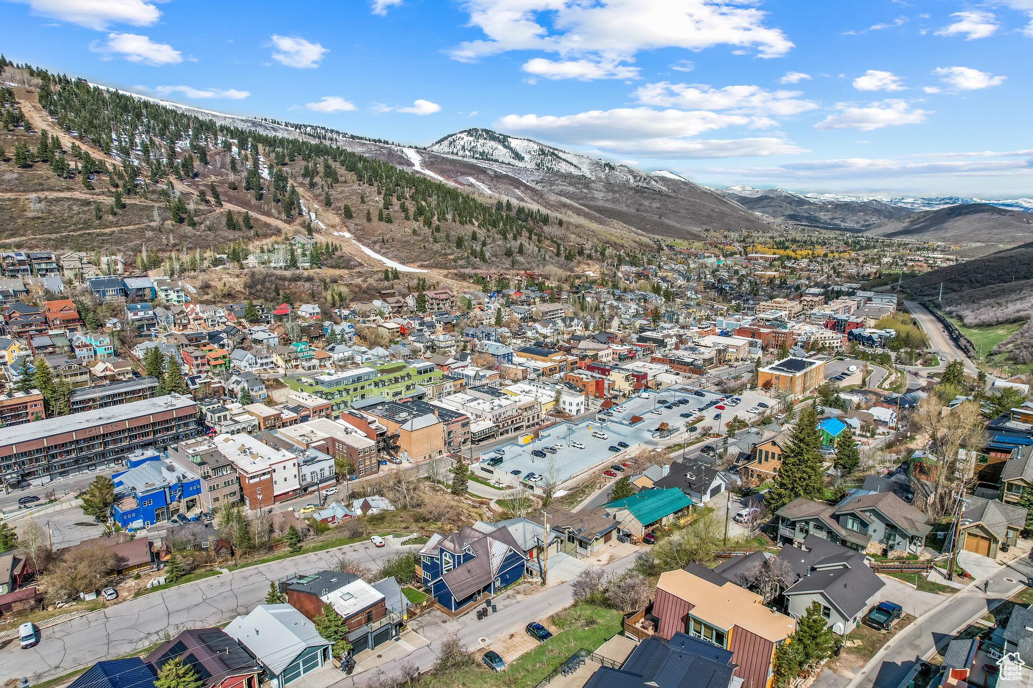 Birds eye view of property with a mountain view