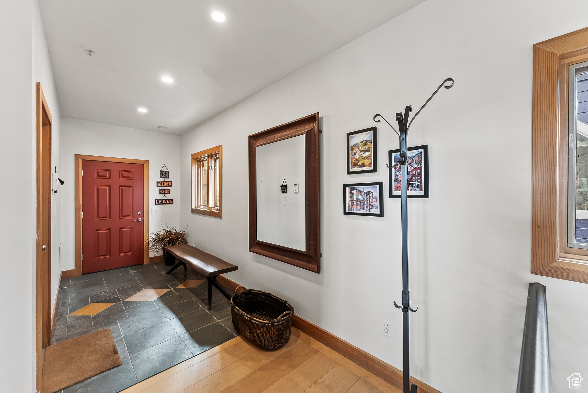 Entryway featuring dark tile flooring