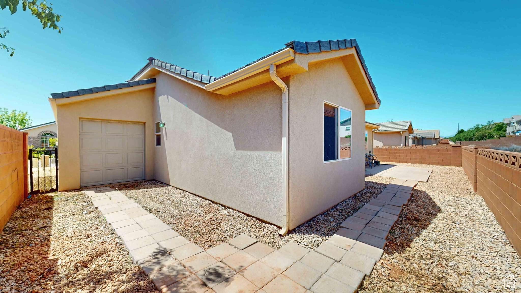 View of home's exterior featuring a garage