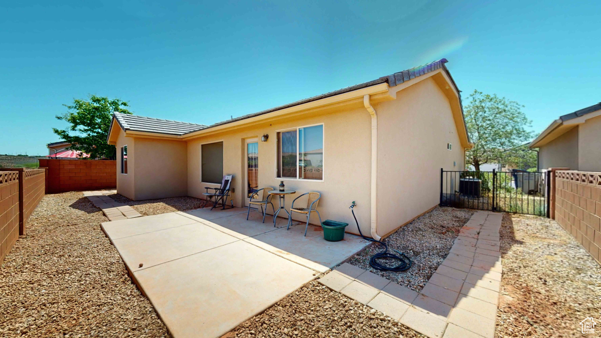 Rear view of house featuring a patio