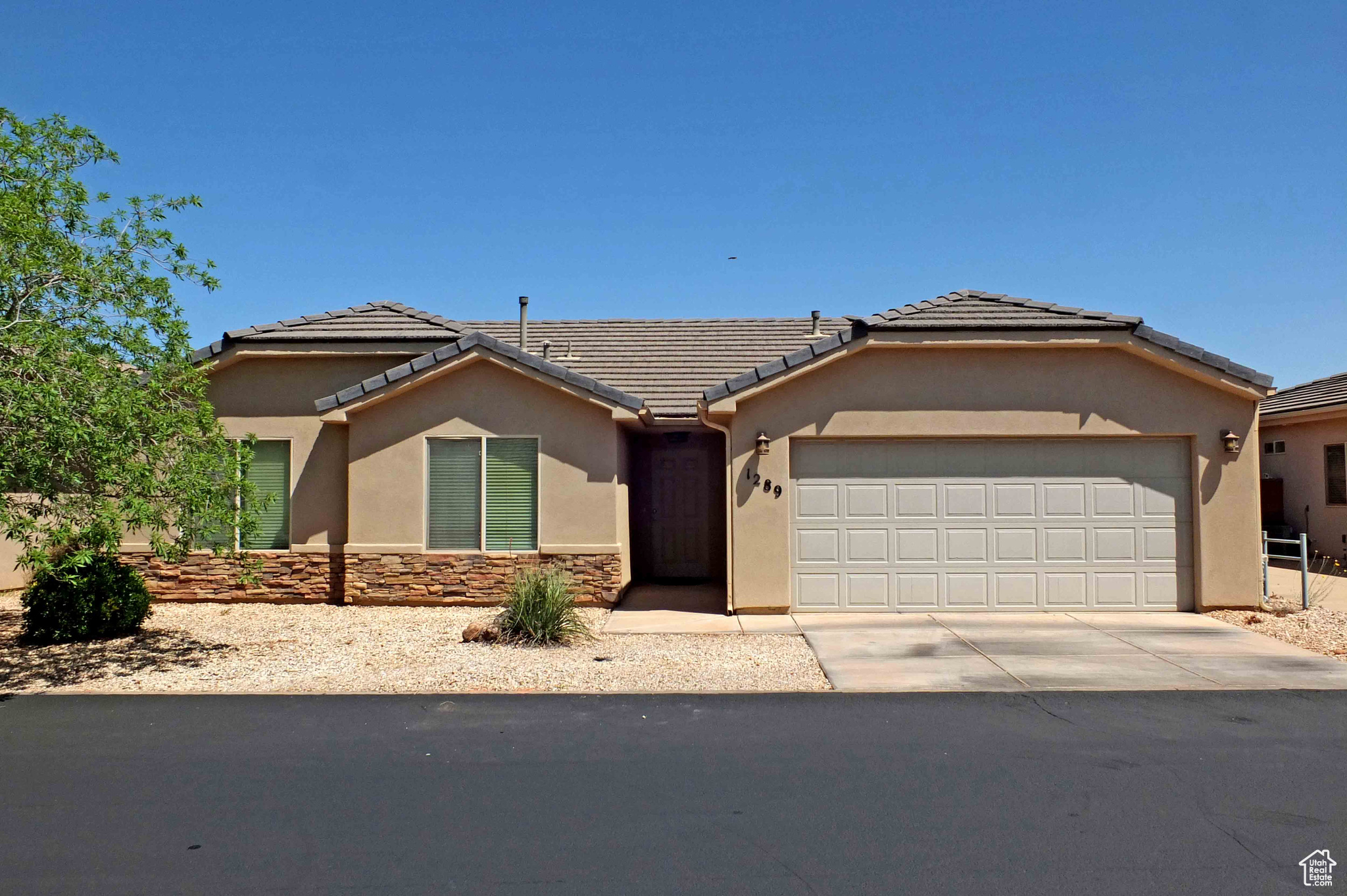 View of front of home with a garage