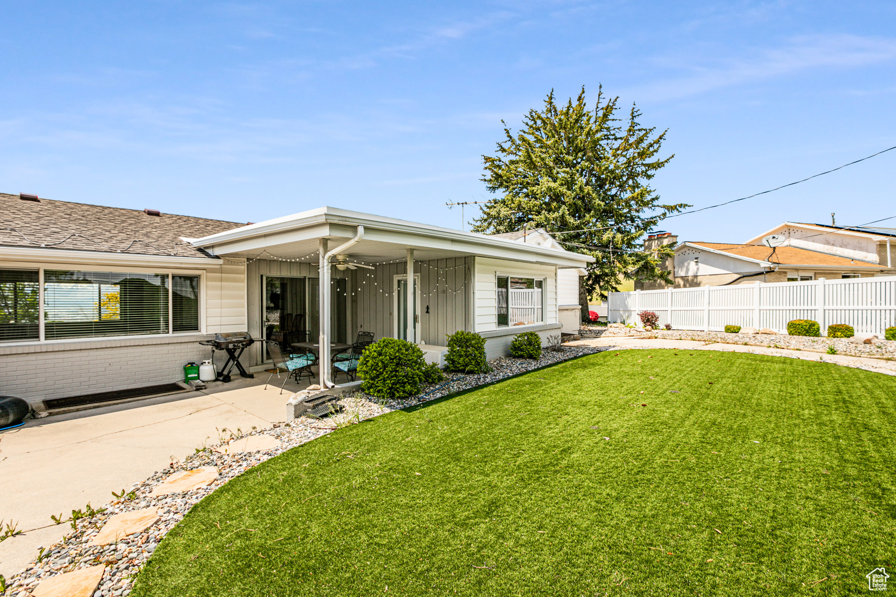 View of back of property with a patio area