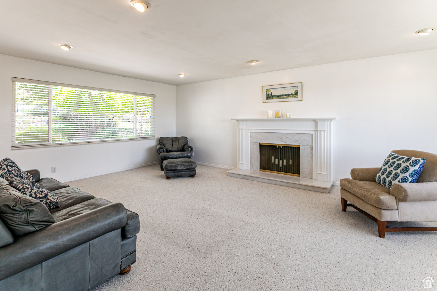 Living room and fireplace with marble surround