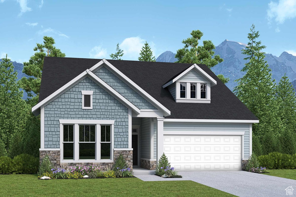Craftsman-style house with a front yard and a mountain view