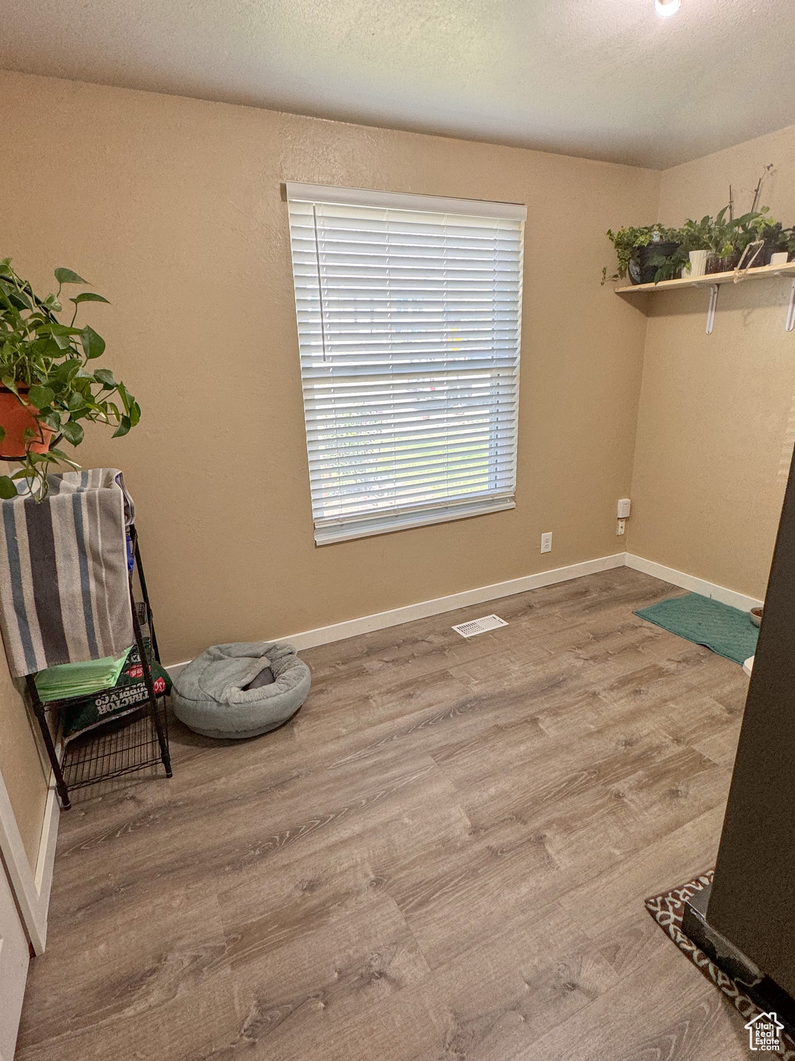 Interior space with hardwood / wood-style flooring