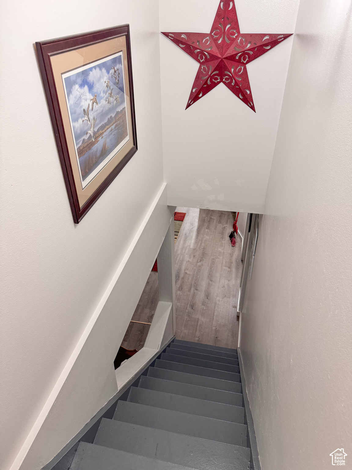 Staircase with wood-type flooring