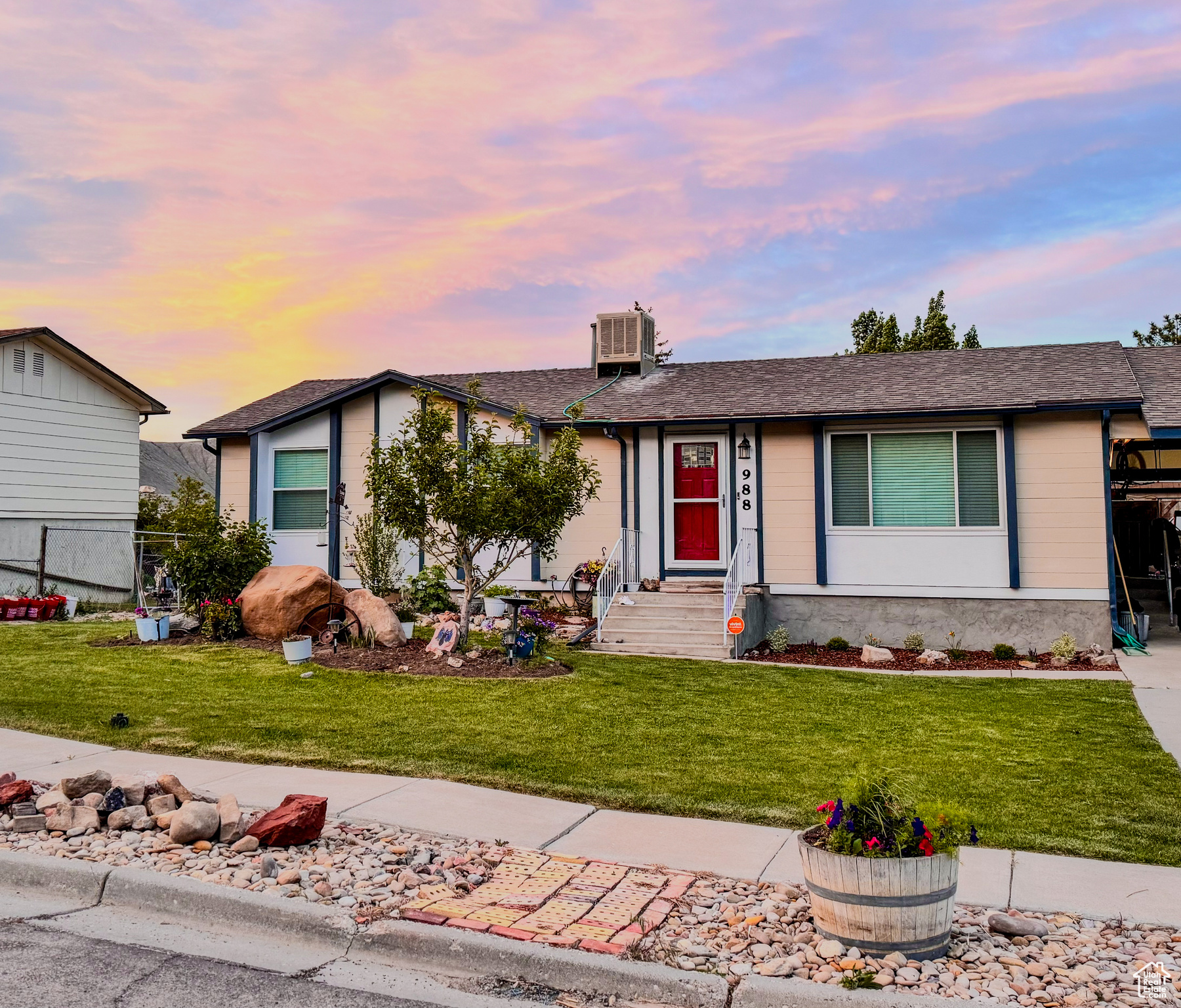 Ranch-style house with a yard