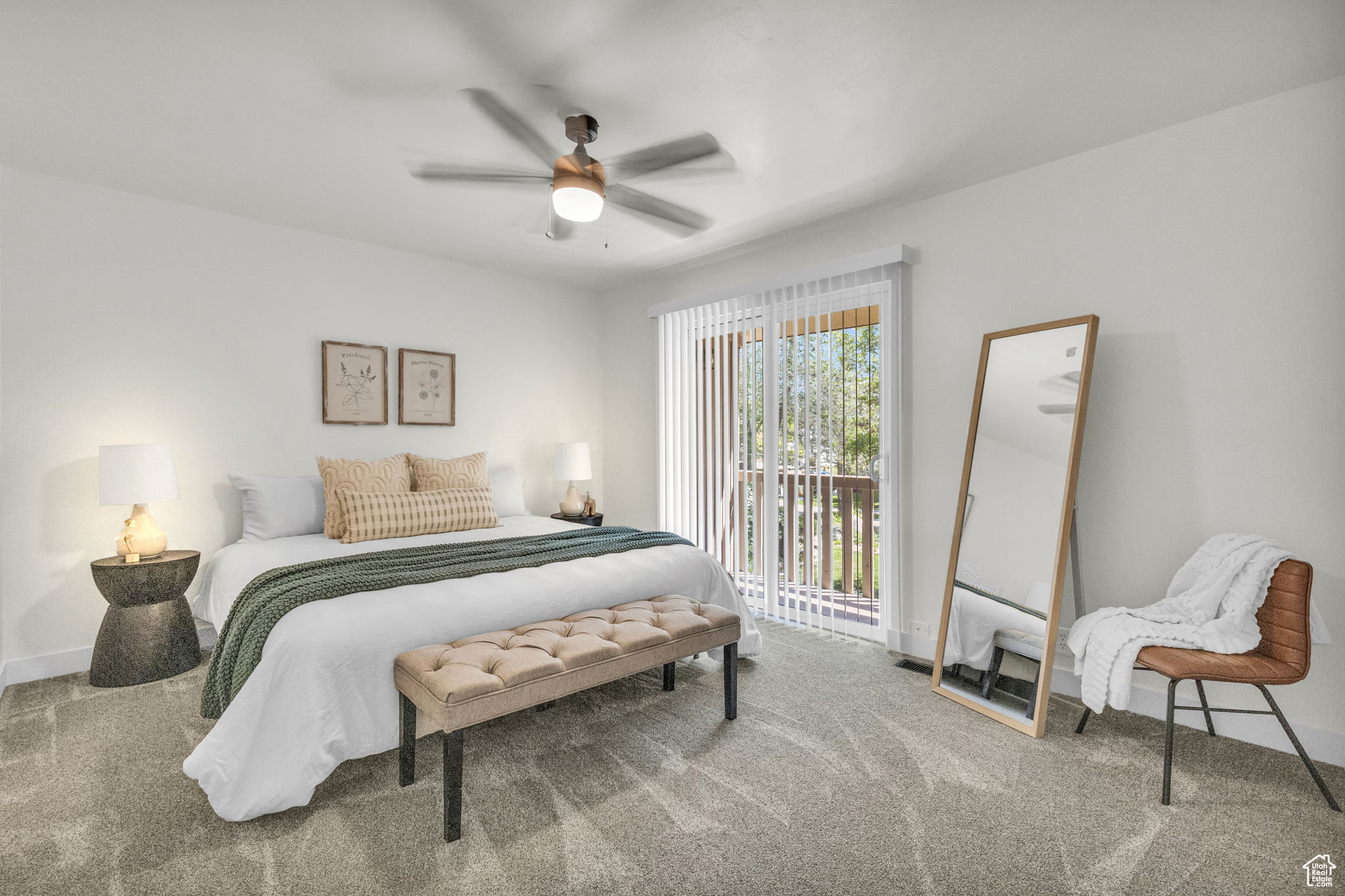 Bedroom featuring access to outside, carpet floors, and ceiling fan