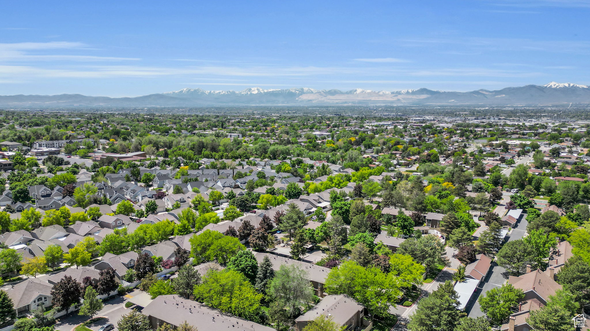 Birds eye view of property with a mountain view