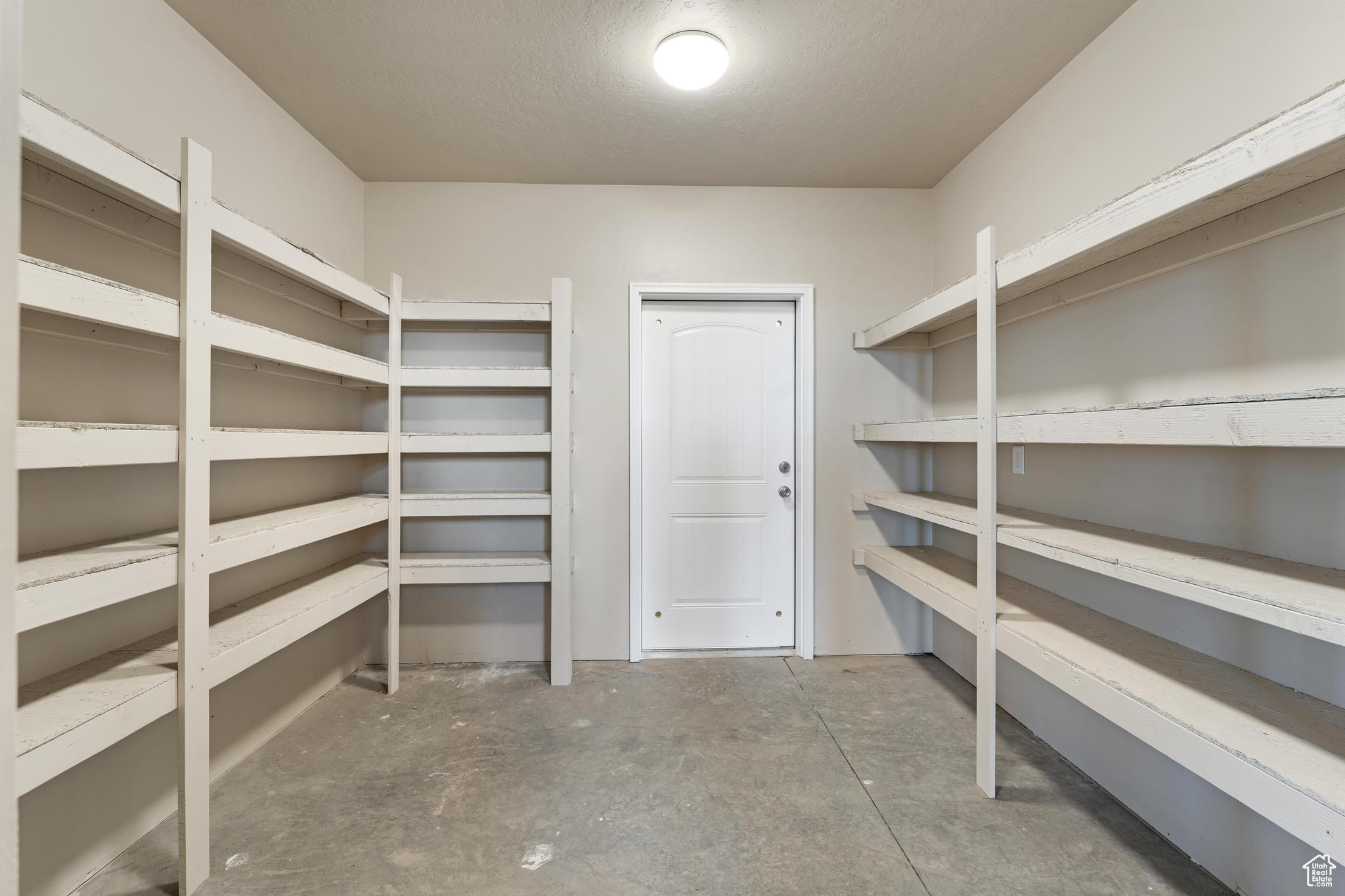 View of large storage room in basement