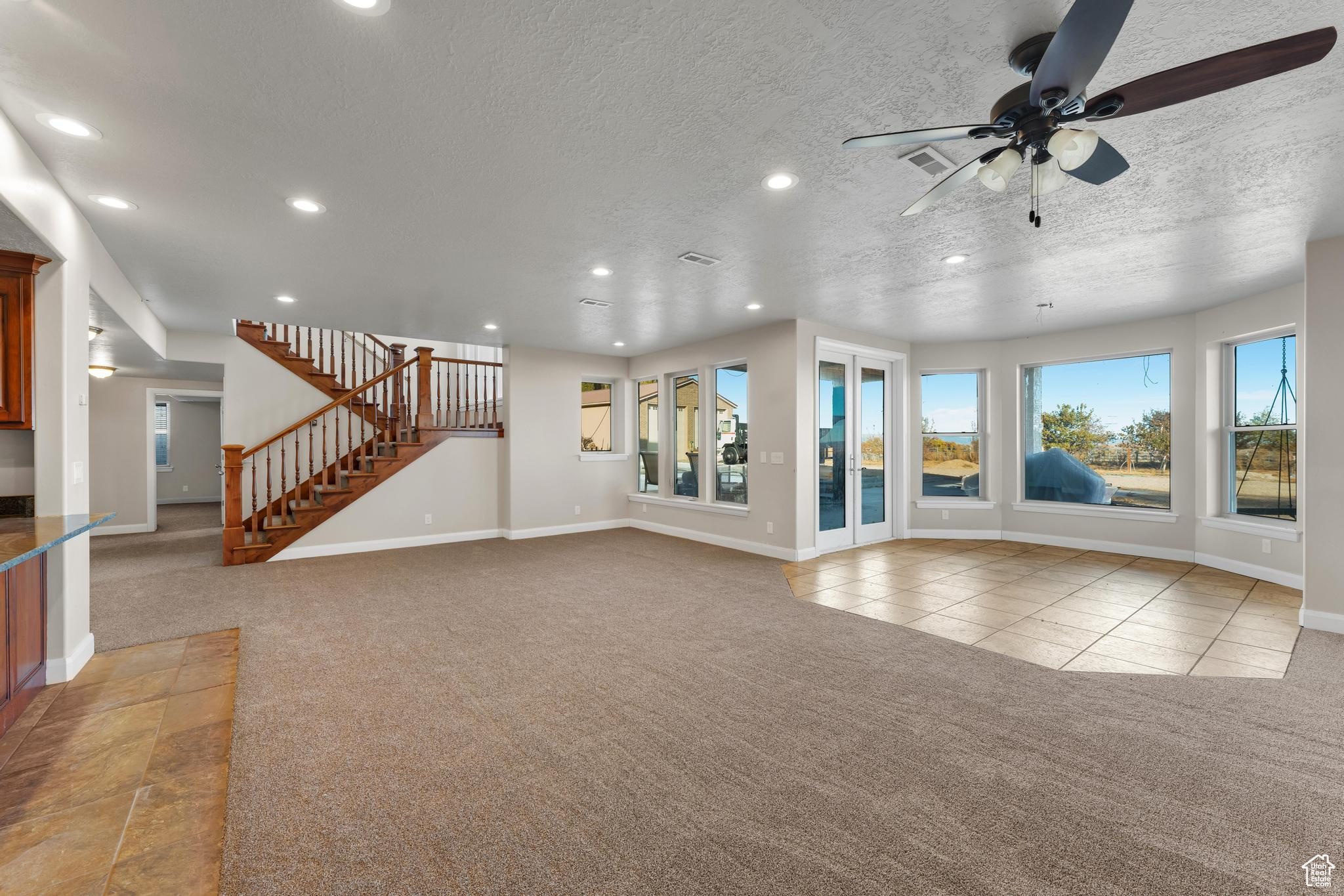 Large walk out basement family room with amazing natural light.