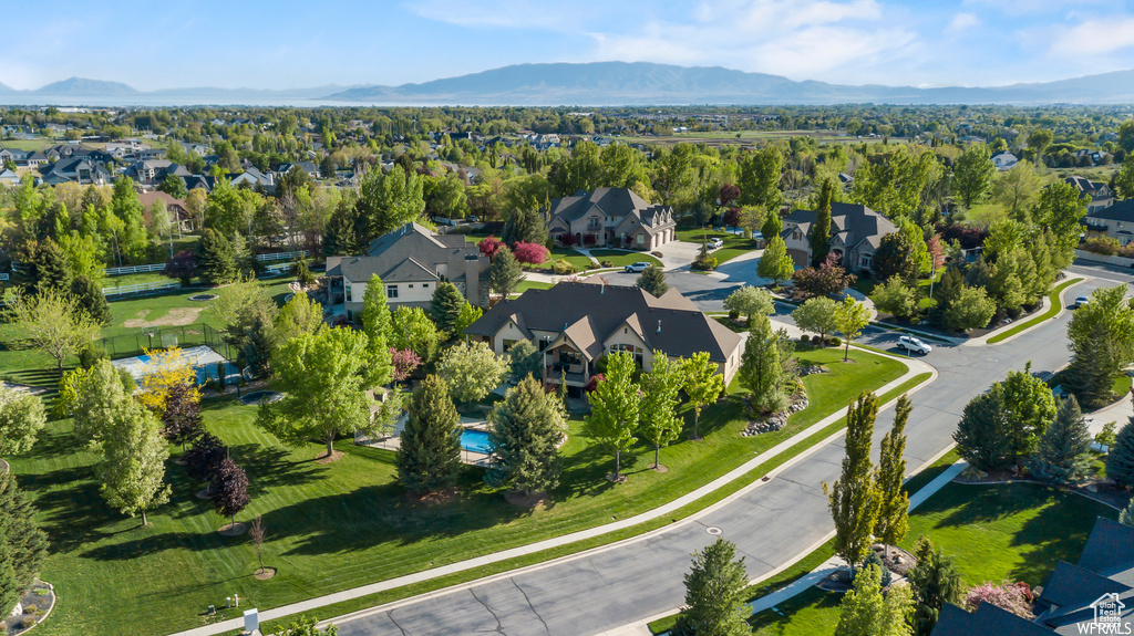 Birds eye view of property with a mountain view