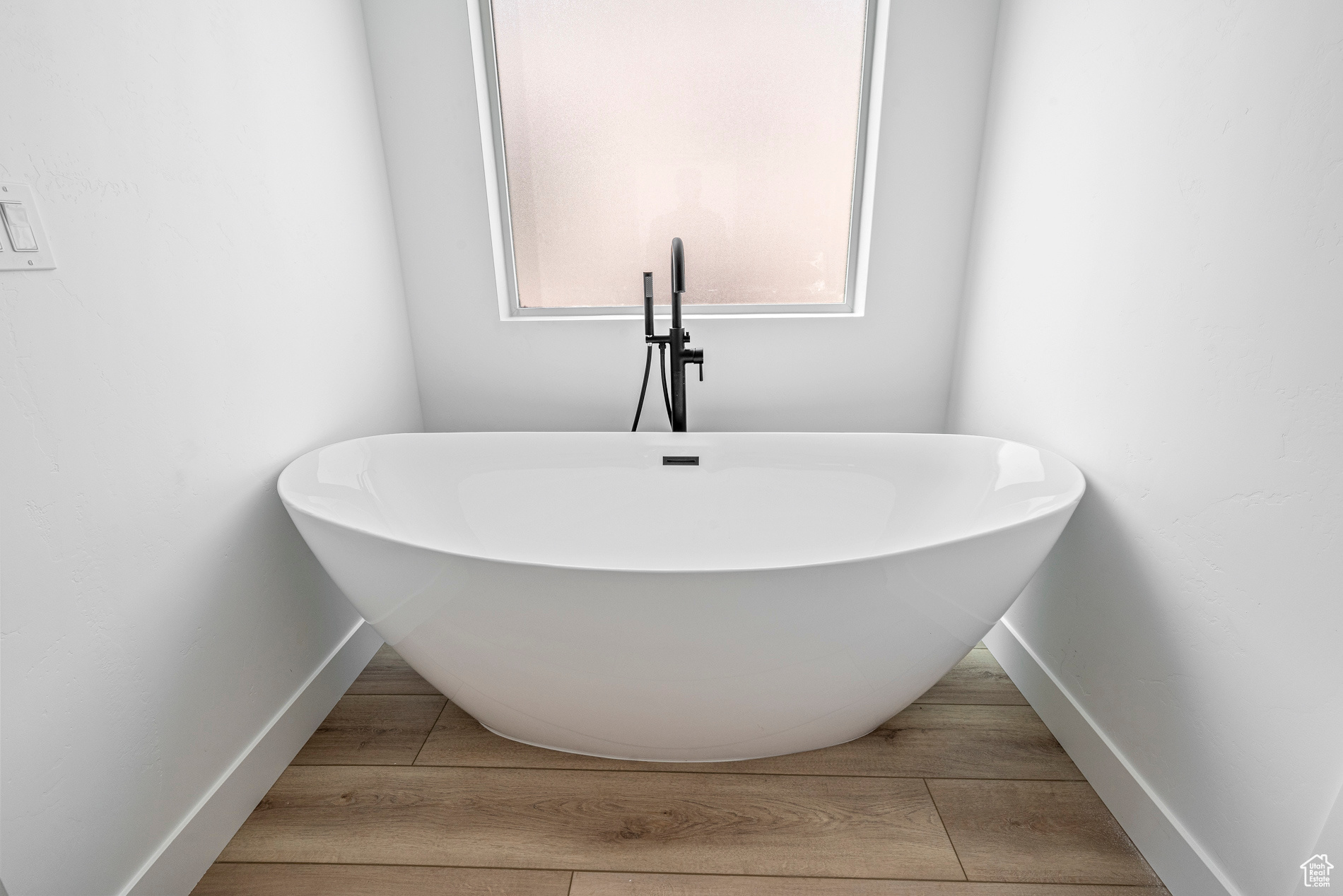 Bathroom featuring wood-type flooring