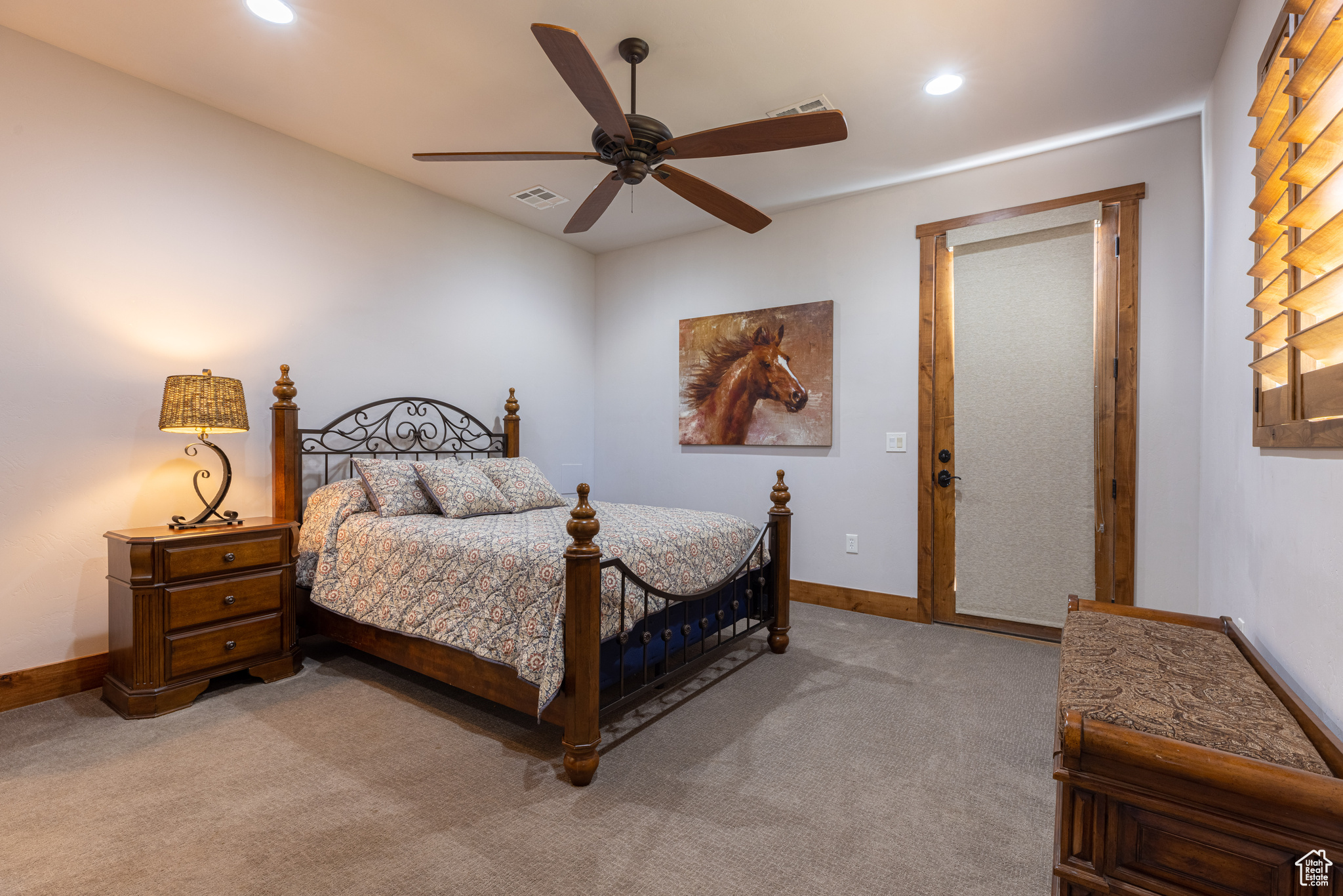 Casita Carpeted bedroom featuring ceiling fan w/ensuite bathroom
