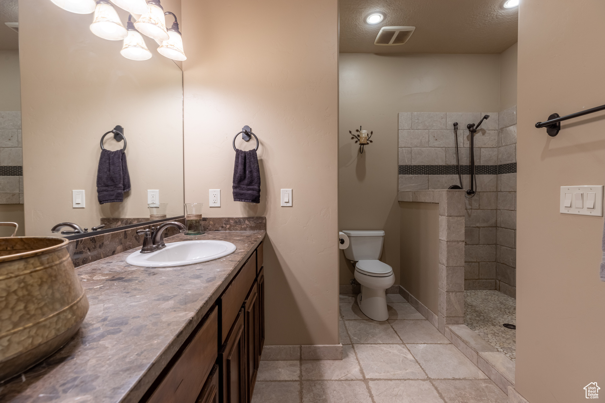 2nd Bathroom perspective featuring a tile floors, shower, stone vanity and tile floors