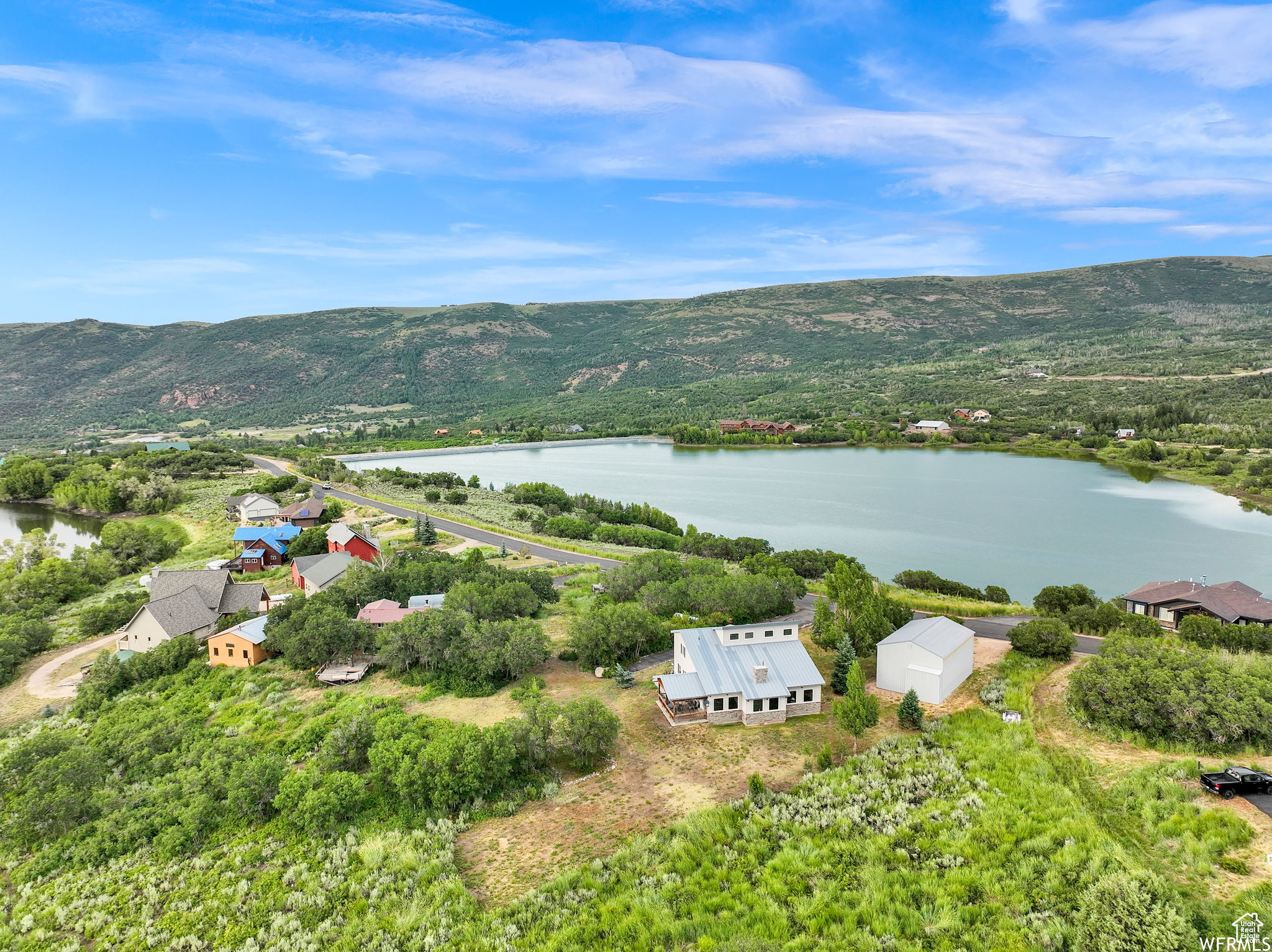 Bird's eye view featuring a water and mountain view