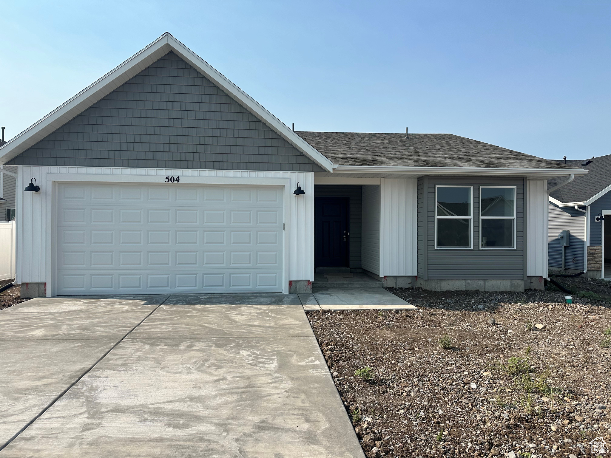 View of front facade with a garage