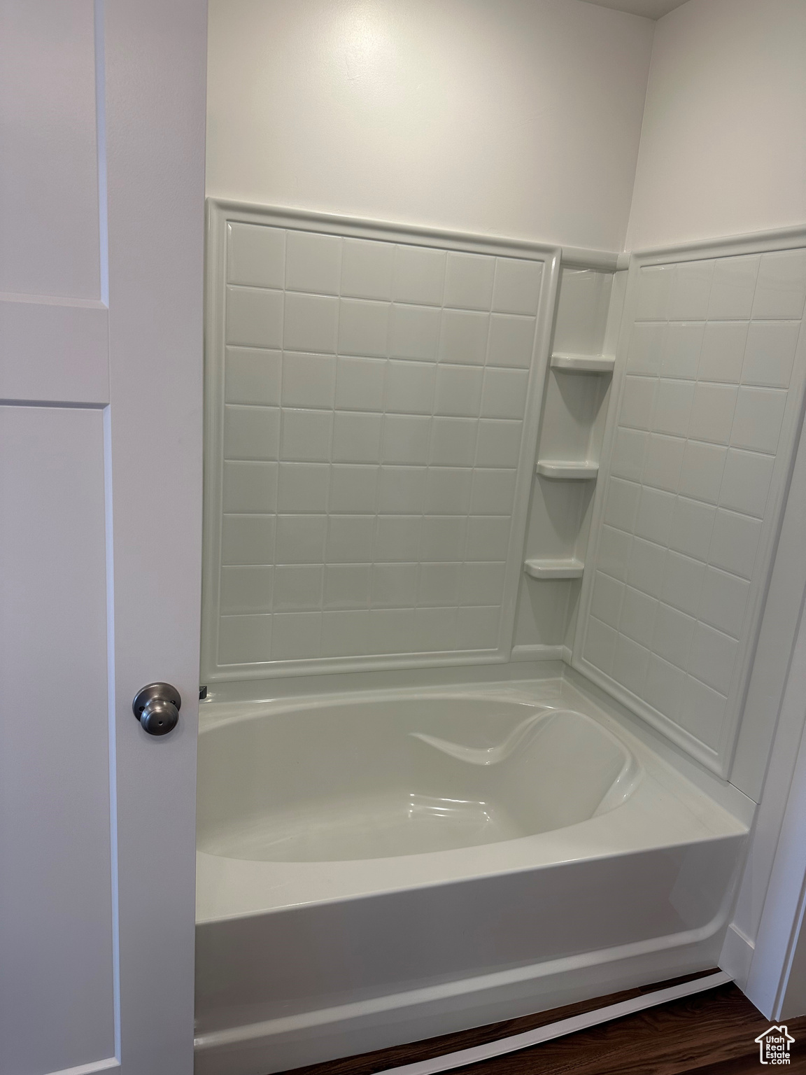 Bathroom with hardwood / wood-style floors