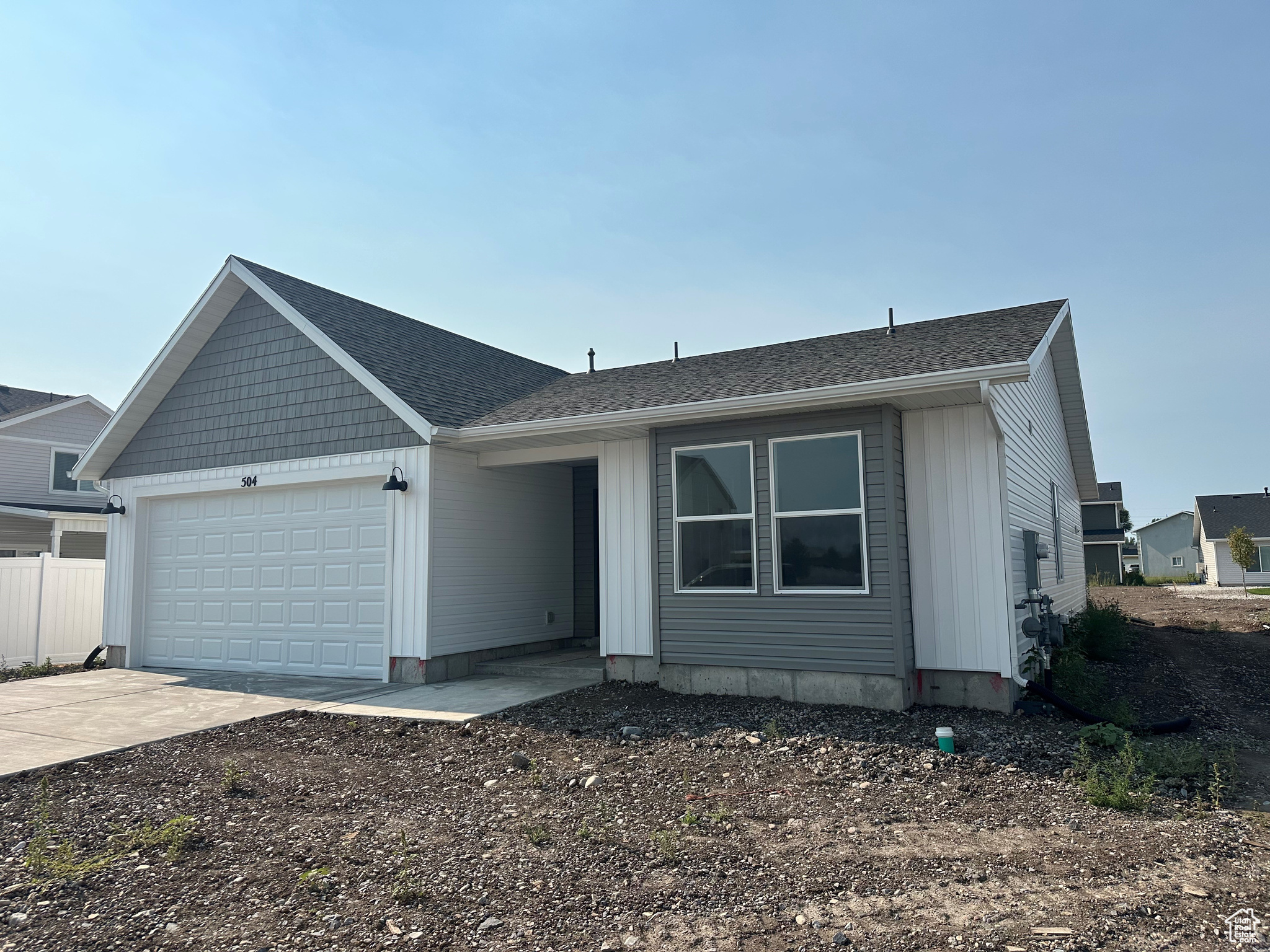 View of front of property with a garage