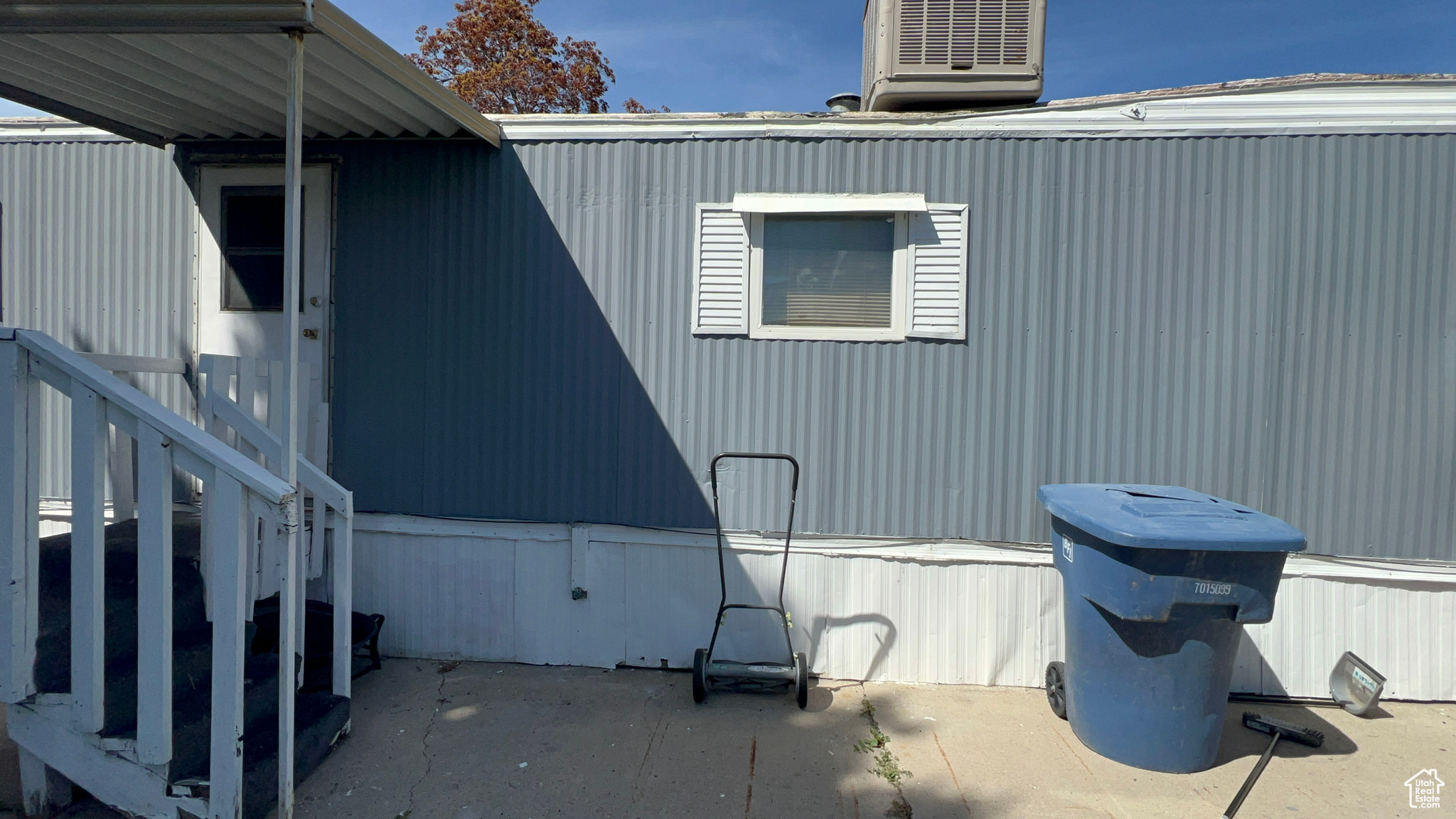 View of property exterior featuring a patio area