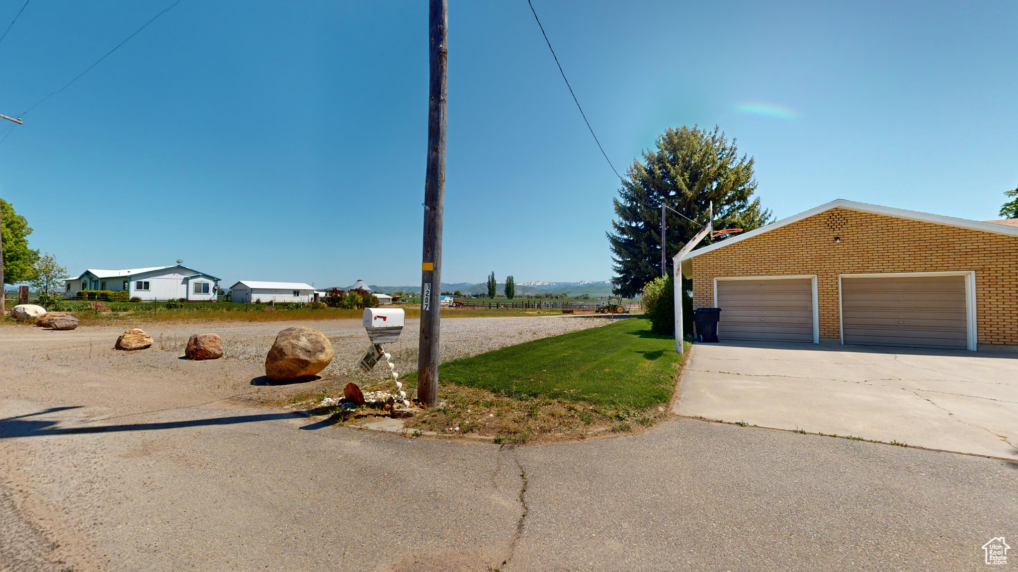 View of yard featuring a garage