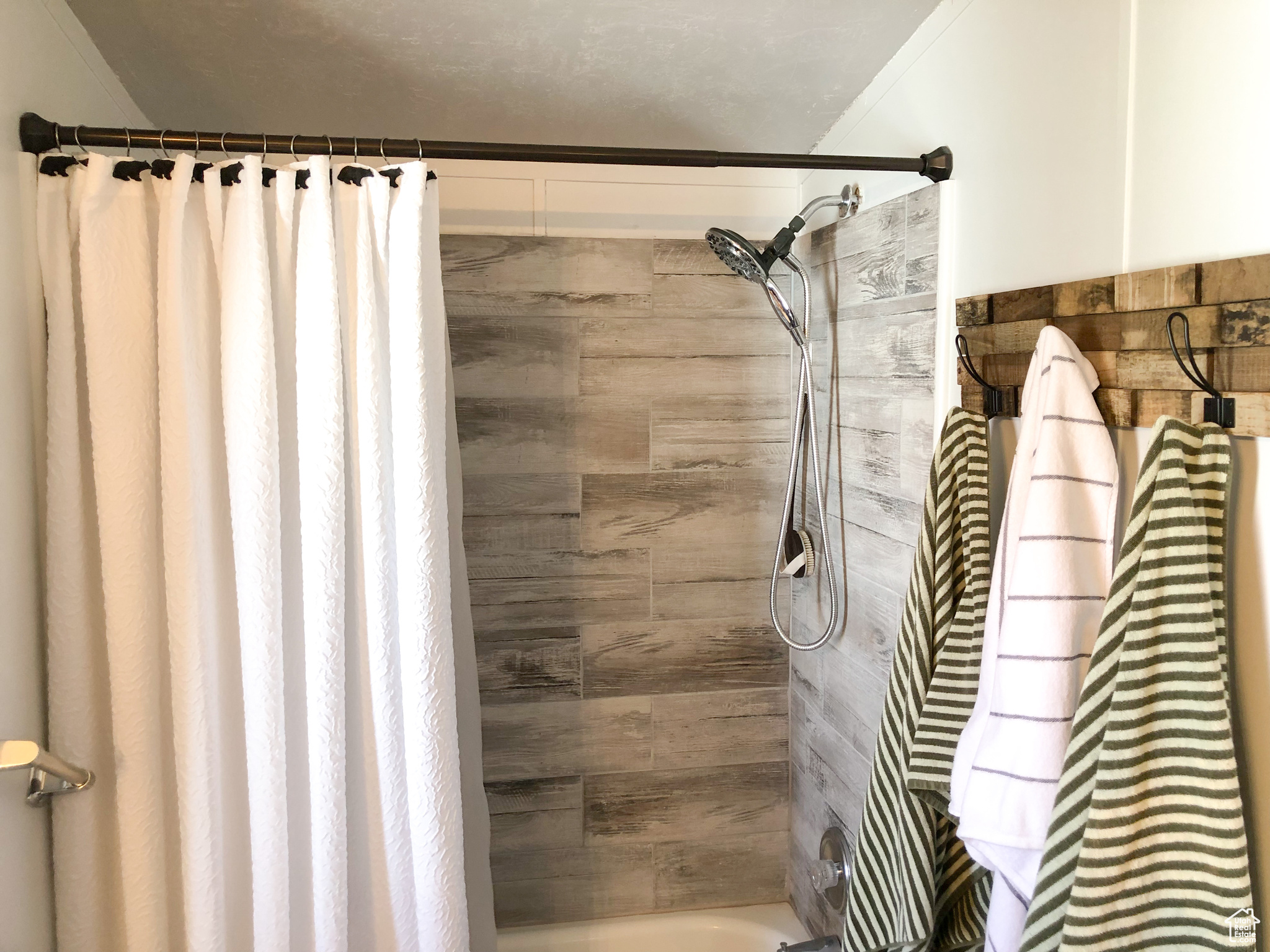 Primary Bathroom featuring shower / bath combo