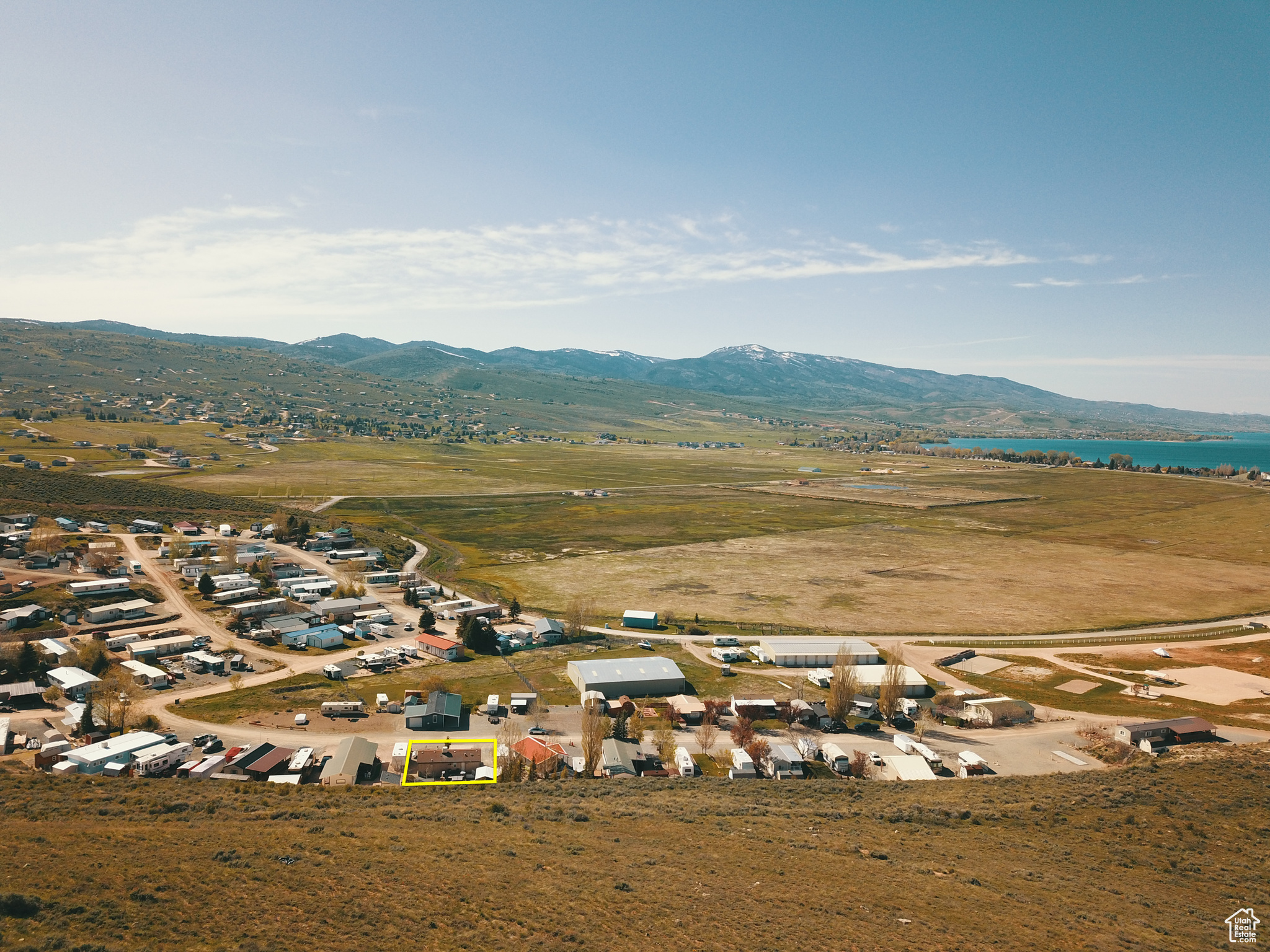 Aerial view with a mountain view and a rural view