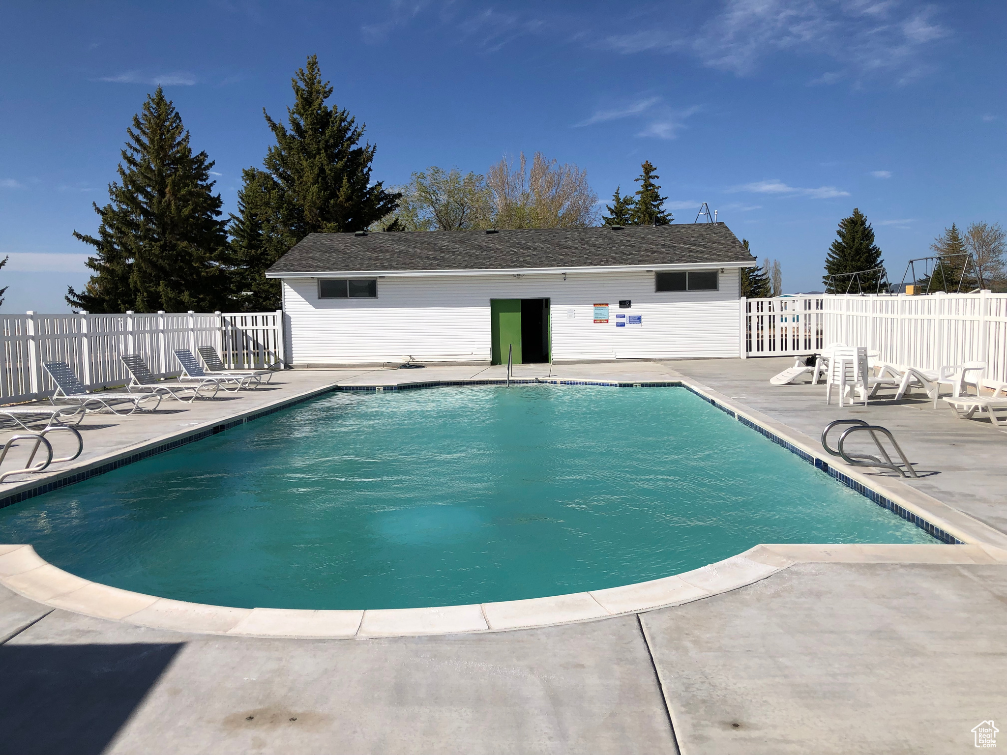 View of swimming pool with a patio