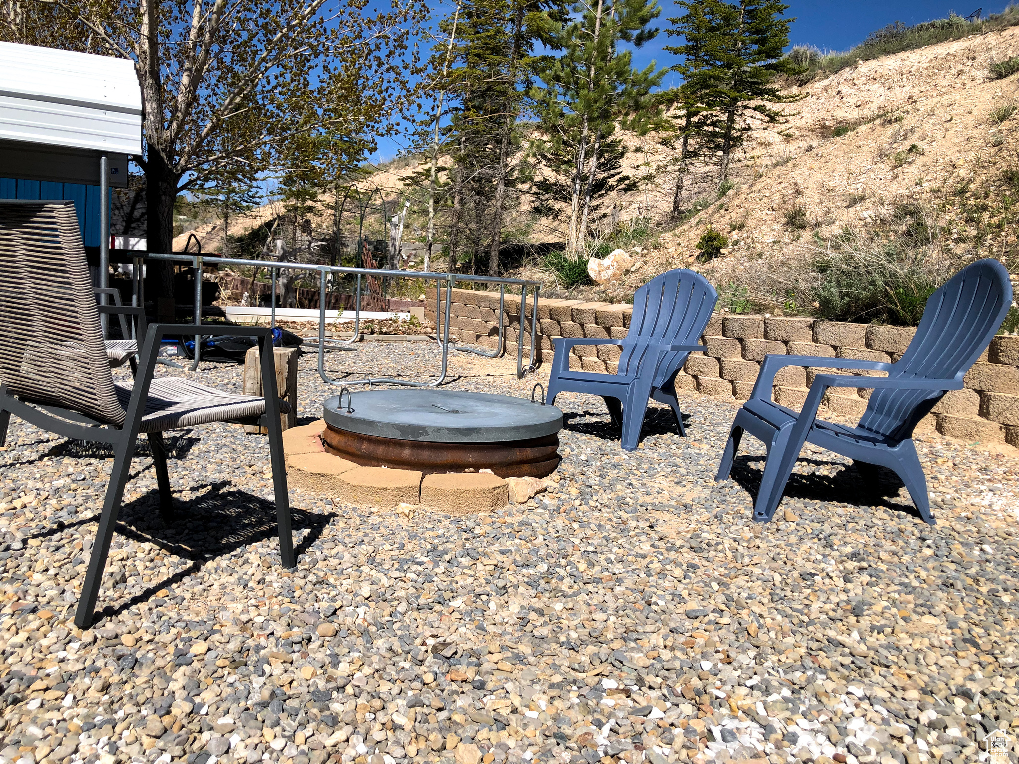 View of yard with an outdoor fire pit