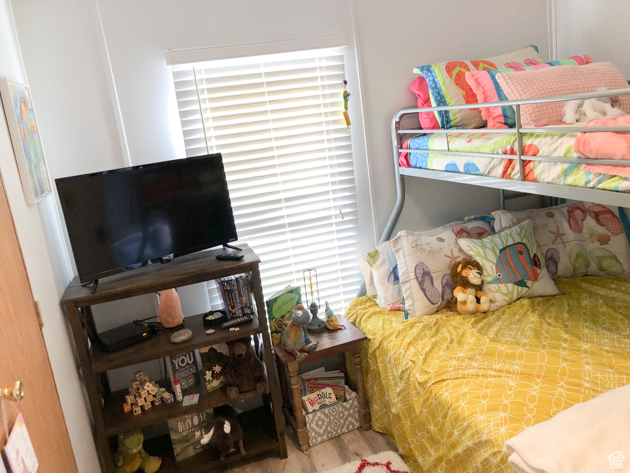 Bedroom with wood-type flooring