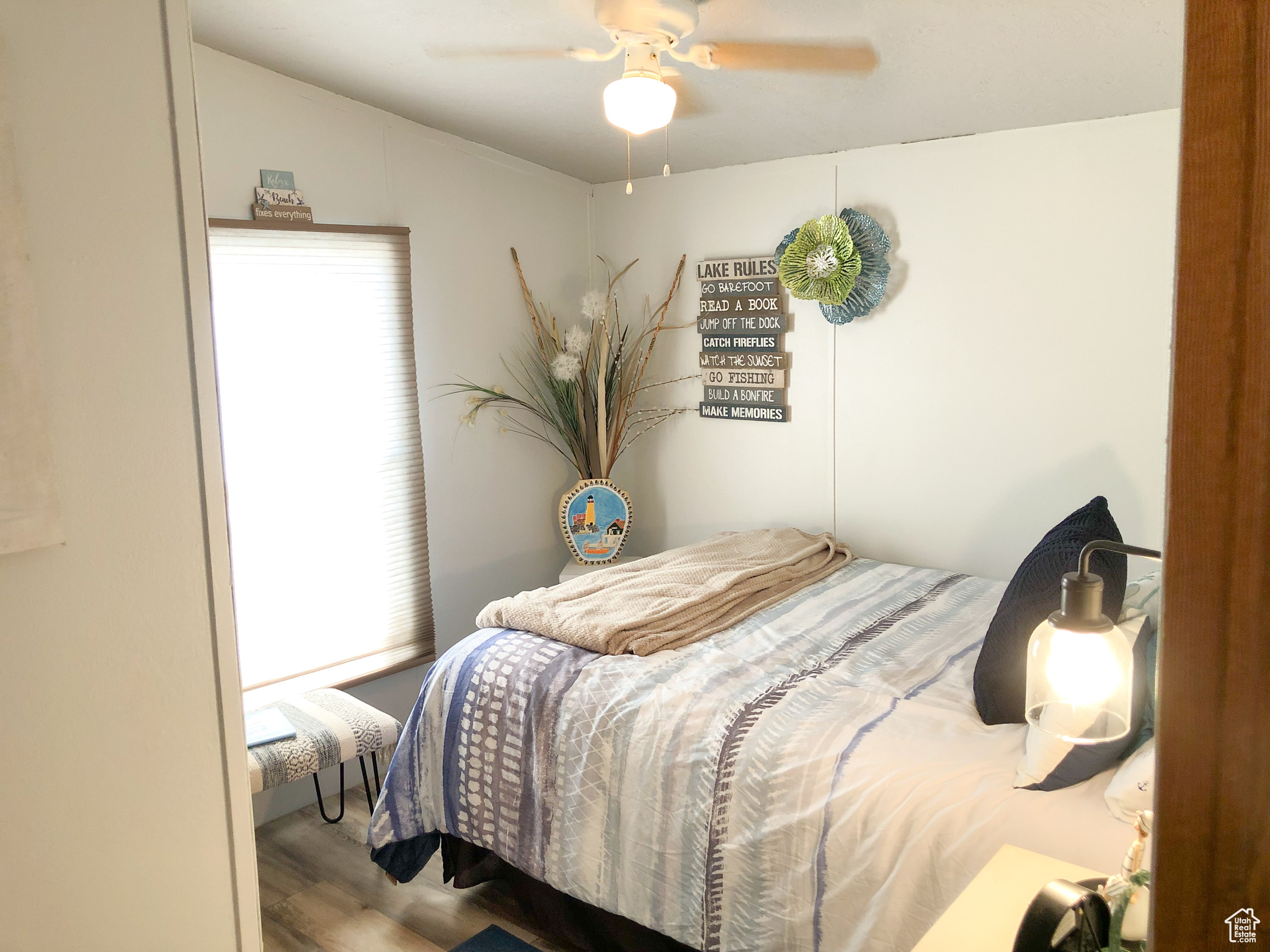 Bedroom 2 featuring hardwood / wood-style flooring and ceiling fan