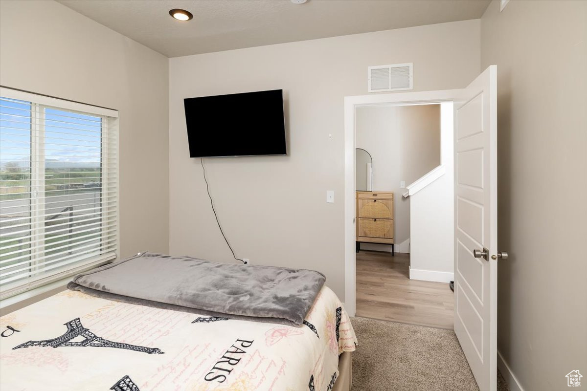 Bedroom featuring hardwood / wood-style floors